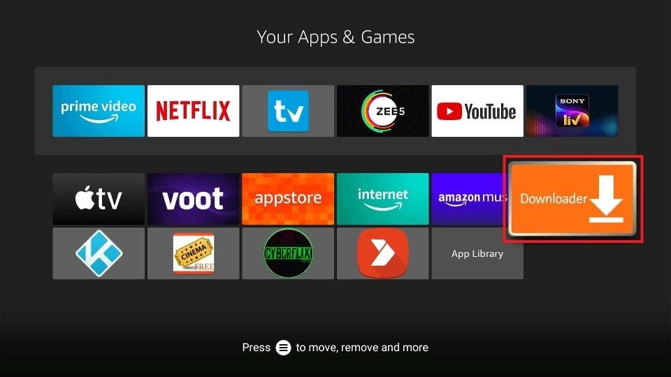 Alt Text: A screenshot of the Amazon Firestick's "Your Apps & Games" home screen grid. Prominent icons include official apps like Prime Video, Netflix, YouTube, Apple TV, and ZEE5. The Downloader app is highlighted with a red box in the bottom right corner, indicating its importance for sideloading apps. [Smart IPTV channel list on Firestick]